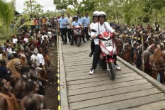 Jokowi Tak Bisa Dipisahkan dari Papua