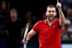 Tenis Prancis Terbuka: Thiem & Cilic Melaju ke Putaran Ketiga