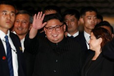 Men in Black Kim Jong-Un Menyita Perhatian Warga Singapura
