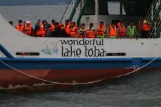 KM SINAR BANGUN TENGGELAM: Keluarga Berharap Penumpang yang Tenggelam Diangkat