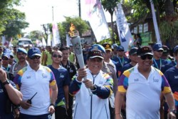 Kirab Obor Asian Games Disambut Antusias Masyarakat Bali 