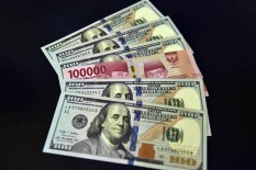 Ini Lo Penyebab Rupiah Tembus Rp14.700 per Dolar AS