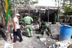 Satlinmas Bantu Kegiatan TMMD di Balecatur, Gamping