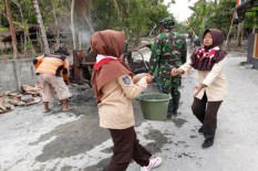 Pramuka Saka Wira Kartika Dukung Kegiatan TMMD di Sleman