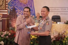 Garuda dan Polri Eratkan Kemitraan Layanan Jasa Penerbangan 