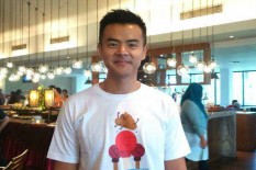 Dion Wiyoko Senang Berburu Momen Lewat Lensa Kamera     
