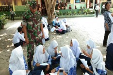 Satgas TMMD Ikut Cerdaskan Anak Bangsa