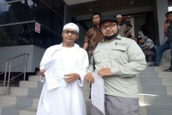 Dituduh Hina Bendera Tauhid, Ustaz Abu Janda Dipolisikan