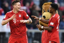 Hasil Bundesliga: Bayern Samai Poin Dortmund