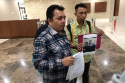 Buat Video Turunkan Foto Presiden, Pria Ini Dilaporkan ke Mabes Polri