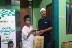 Gandeng Komunitas Motor, Evalube Santuni Anak Yatim
