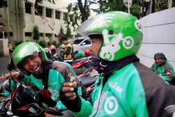 Wow, Sehari Ribuan Driver Grab Hijrah ke Gojek