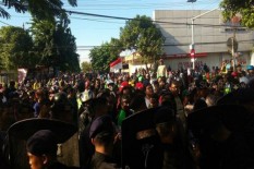 Dipaksa Menyerahkan Diri, Mahasiswa Papua di Surabaya Ditembaki Gas air Mata