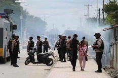 Jokowi Didesak Turun Tangan Selesaikan Masalah di Papua