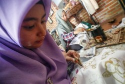Jokowi Ajak Masyarakat Merawat Batik
