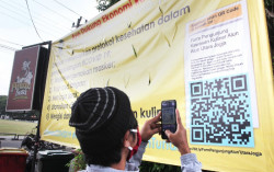 Kendalikan Penyebaran Covid-19, Pengunjung Alun-Alun Utara Diwajibkan Isi Buku Tamu Digital