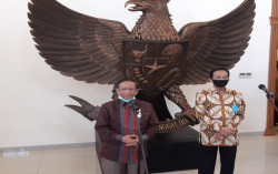 Berkunjung ke Kepatihan, Mahfud MD Beri Alasan Pemerintah Tak Menunda Pilkada