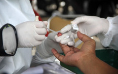 Covid-19, Inggris Sedang Tes Air Liur Tanpa Swab 