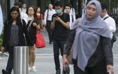 Singapura Bakal Tes Covid-19 untuk Warga Usia 13 Tahun
