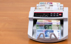 Akhir Pekan Ini Rupiah Diprediksi Menguat Terbatas