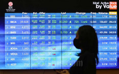 OPINI: Covid-19, IHSG, dan Kebijakan Ekonomi