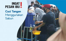 Aparat Bagikan Masker Hingga ke Daerah Perbatasan