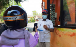 Berlibur ke Pantai Bisa Pakai Kartu Vaksin 