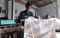 Dari Kulonprogo, Mister Tom Bawa Daun Tom Mendunia