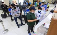 Aturan Terbaru Terbit! Pelaku Perjalanan Luar Negeri Wajib Pakai Masker 3 Lapis