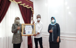 Kulonprogo Terima Penghargaan UHC dari BPJS Kesehatan