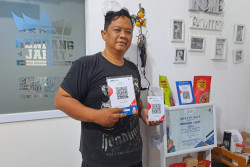 Membumikan QRIS, Mendorong Kemajuan dengan KUR
