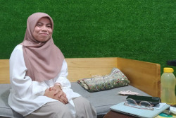Minyak Telon Jadi Cara Perempuan Ini Menebar Cinta