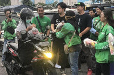 Mengisi Ramadan, Ratusan Mitra Pengemudi Grab Bagi-Bagi Takjil Gratis