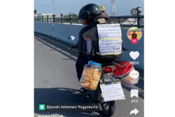 Viral! Tulisan Lucu Pemudik Roda Dua di Arus Mudik Lebaran 2023, Sindir KPU hingga Main Slot
