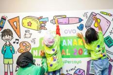Hari Anak Nasional, Grab Beri Sepatu Khusus untuk Anak Mitra Pengemudi