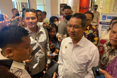 Kurangi Polusi Udara Jakarta, Heru Budi Imbau ASN Beralih ke Kendaraan Listrik