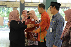 152 PNS Kabupaten Sleman Dapat Satyalancana Karya Satya