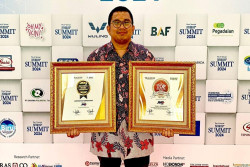 JNE Raih Dua Penghargaan di Ajang The 4th Annual Infobrand.id Summit 2024