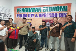 Polda DIY dan Aprindo Bantu Driver Ojol Penyandang Disabilitas untuk Penguatan Ekonomi