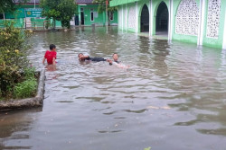 Hujan Deras Rendam Permukiman Warga di Rangkasbitung