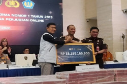 Polri Setor Uang Kasus Judi Online Rp58 Miliar ke Kas Negara