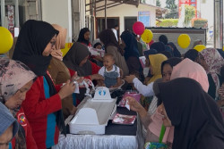 Alfamart Sahabat Posyandu Gandeng Kalbe Nutritionals, Jangkau 2.800 Penerima Manfaat