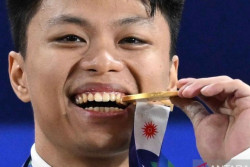 Rahmat Erwin Rebut Emas Asian Games 2026 Sekaligus Cetak Rekor Dunia